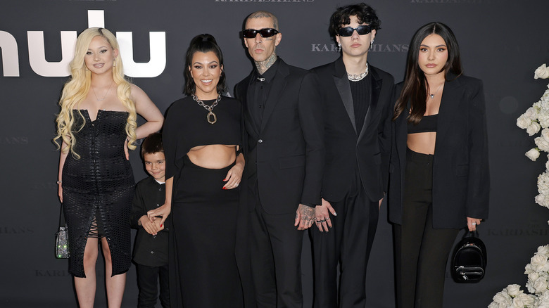 Alabama Barker, Reign Disick, Kourtney Kardashian, Travis Barker, Landon Barker, and Atiana De La Hoya posing together