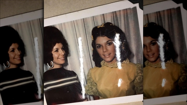 Young Kris Jenner posing with her mother