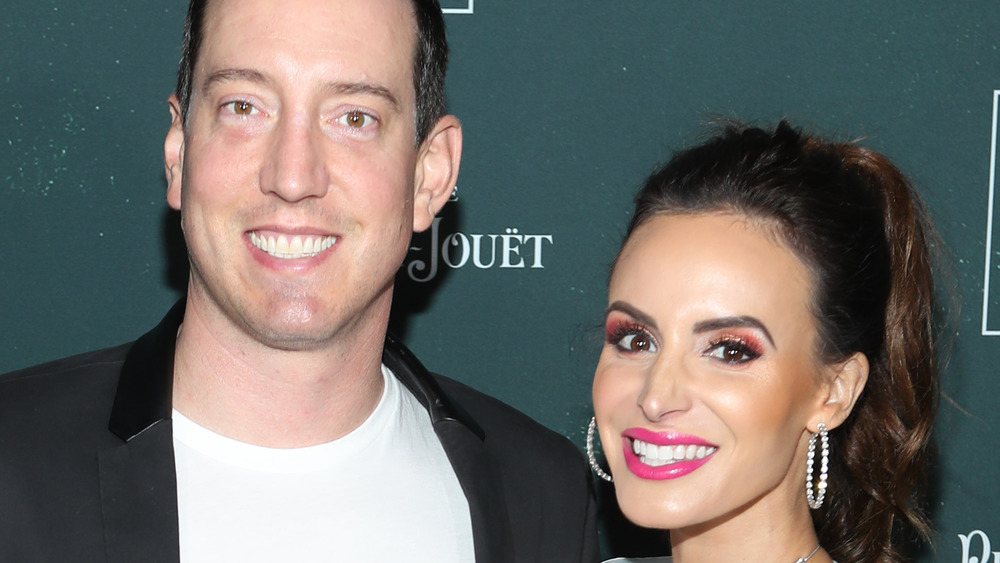 Kyle Busch and his wife Samantha Busch smiling