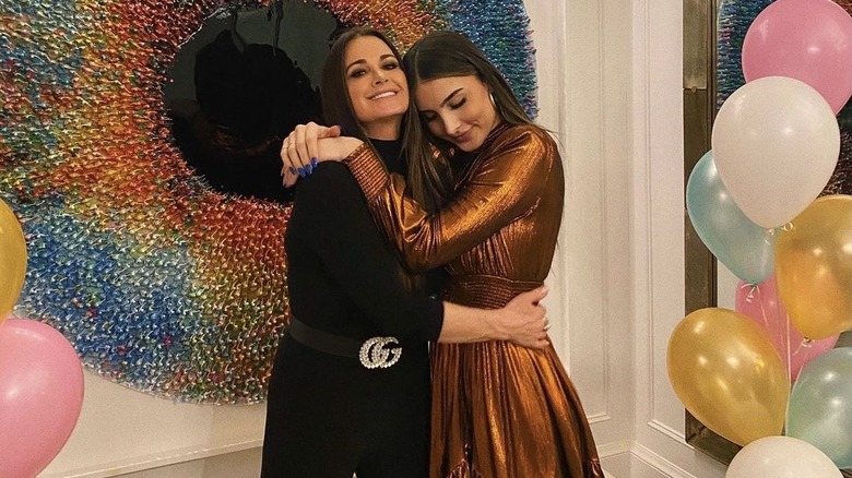 Kyle Richards, Sophia Umansky, hugging 