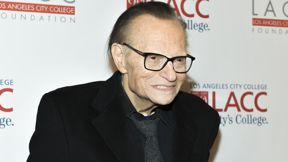 Larry King smiling