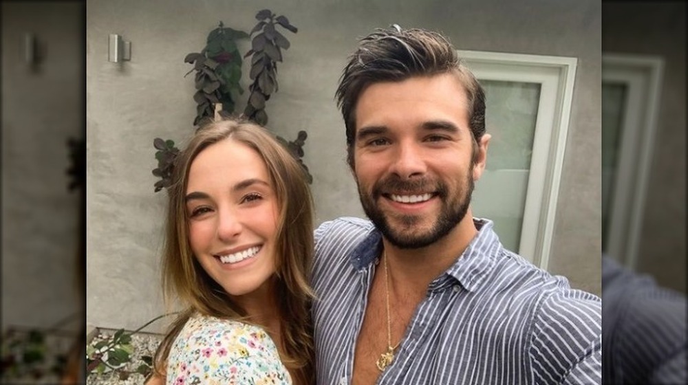 Lauren and Josh Swickard taking a selfie 