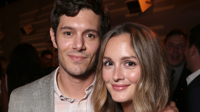 Adam Brody and Leighton Meester smiling