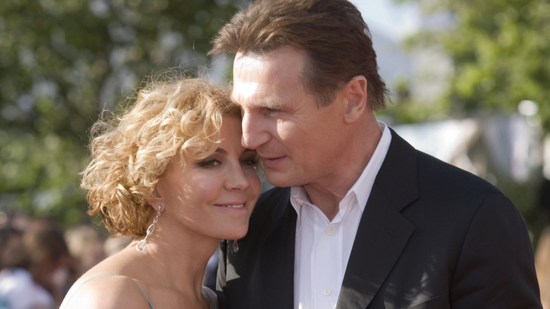 Natasha Richardson and Liam Neeson posing 
