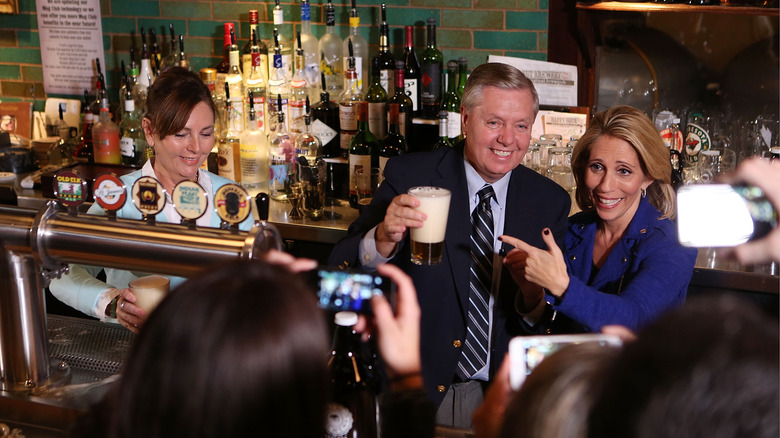 Lindsey Graham and Darline Nordone at a bar in October 2015
