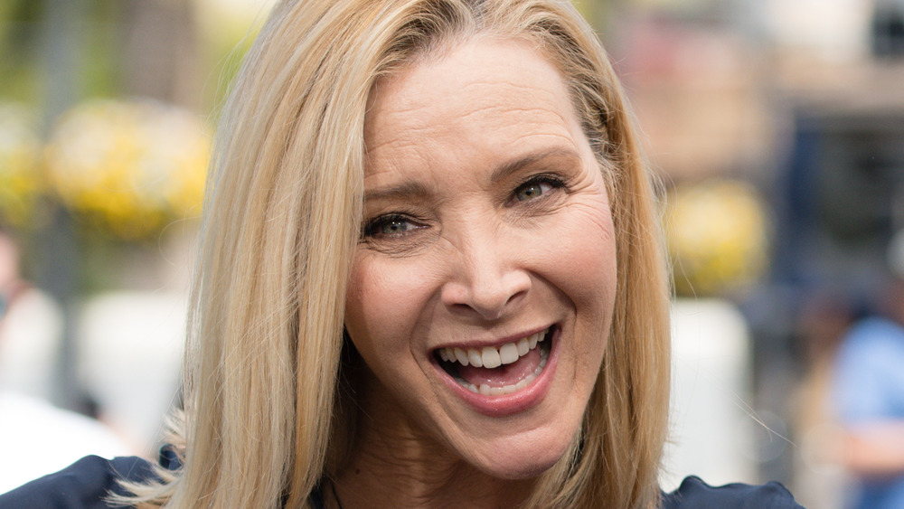 Lisa Kudrow smiling at an event