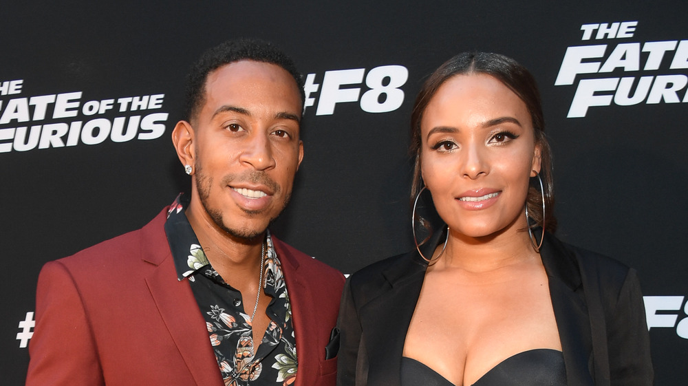 Ludacris and Eudoxie Mbouguiengue smiling