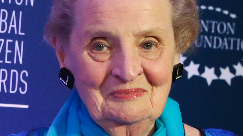 Madeleine Albright wearing black earrings 