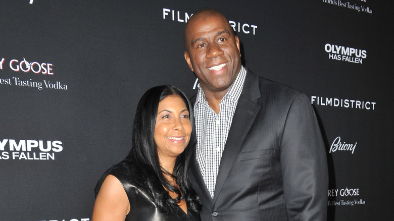 Cookie Johnson and Magic Johnson smiling