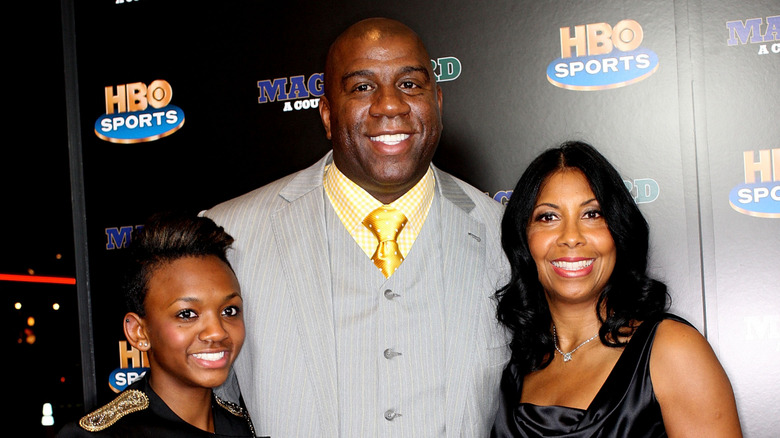 Elisa Johnson Magic Johnson with his wife and daughter