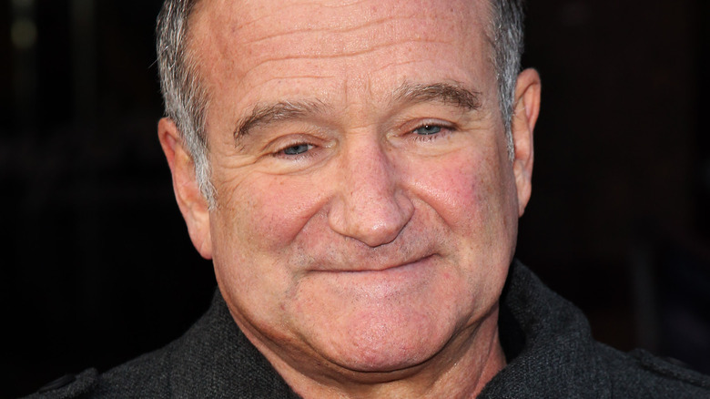 Robin Williams smiling in 2011.