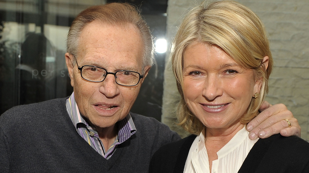 Larry King and Martha Stewart posing together