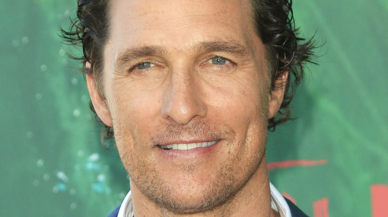 Matthew McConaughey smiles on the red carpet