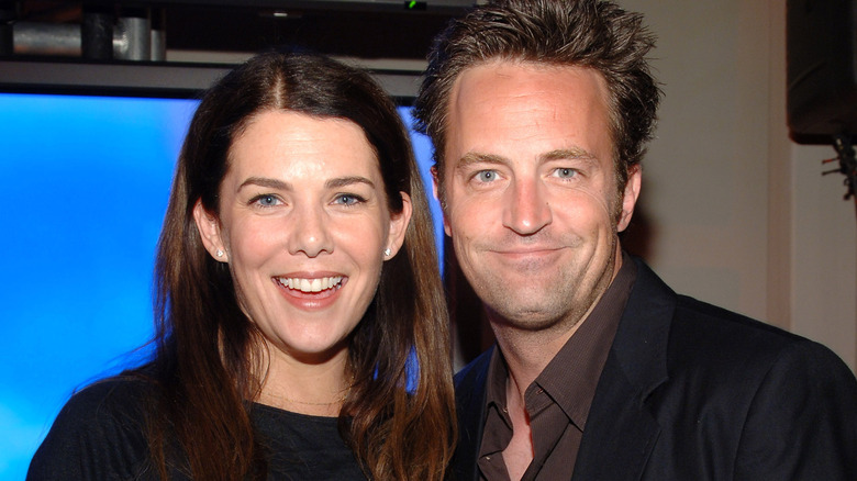 Matthew Perry and Lauren Graham posing