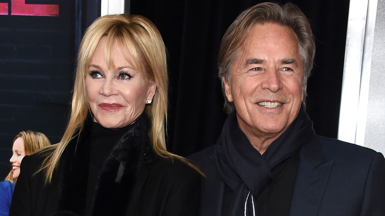 Melanie Griffith Don Johnson posing