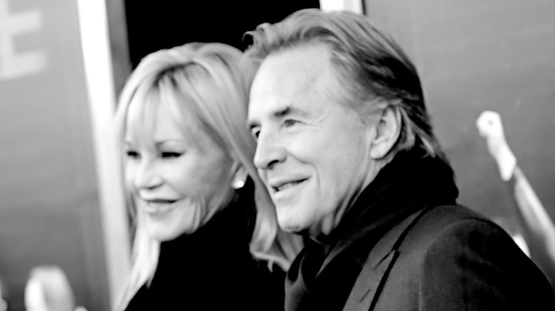 Melanie Griffith and Don Johnson posing