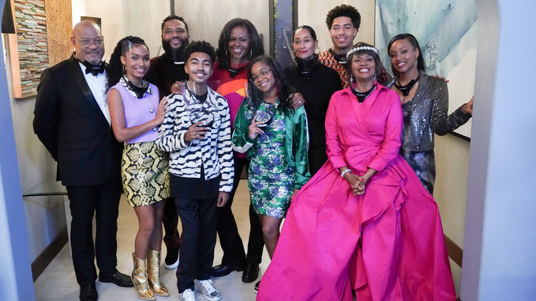 Michelle Obama poses with the Black-ish cast