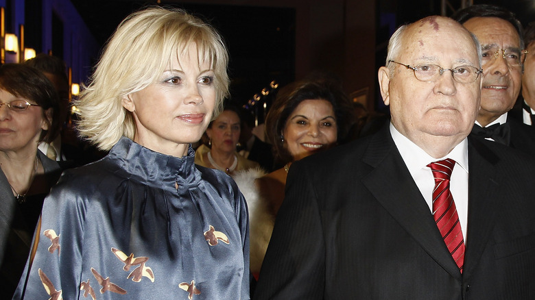Irina Virganskaya and Mikhail Gorbachev walking.