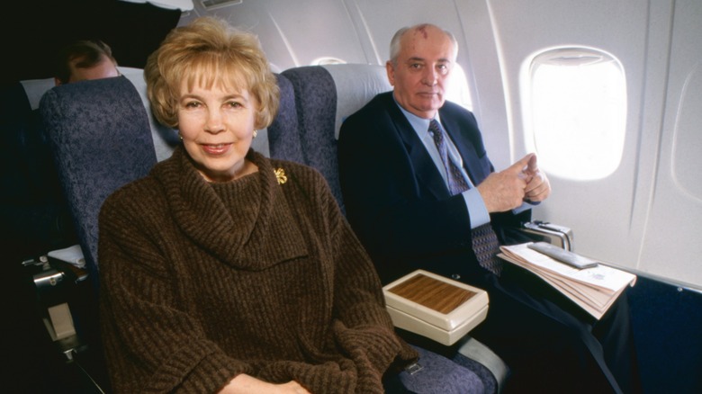 Mikhail and Raisa Gorbachev pose on a place in 1996