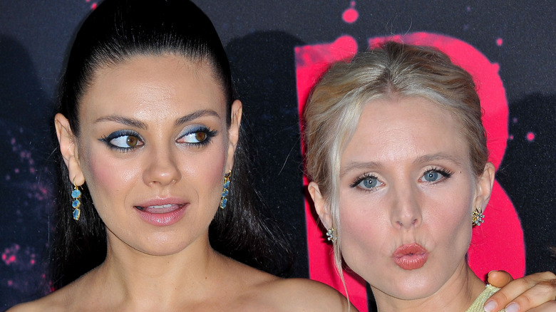 Mila Kunis and Kristen Bell on the red carpet