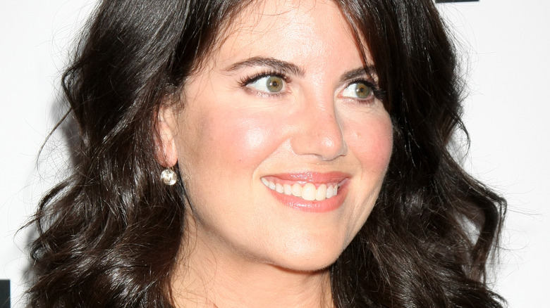 Monica Lewinsky smiling and looking to the side