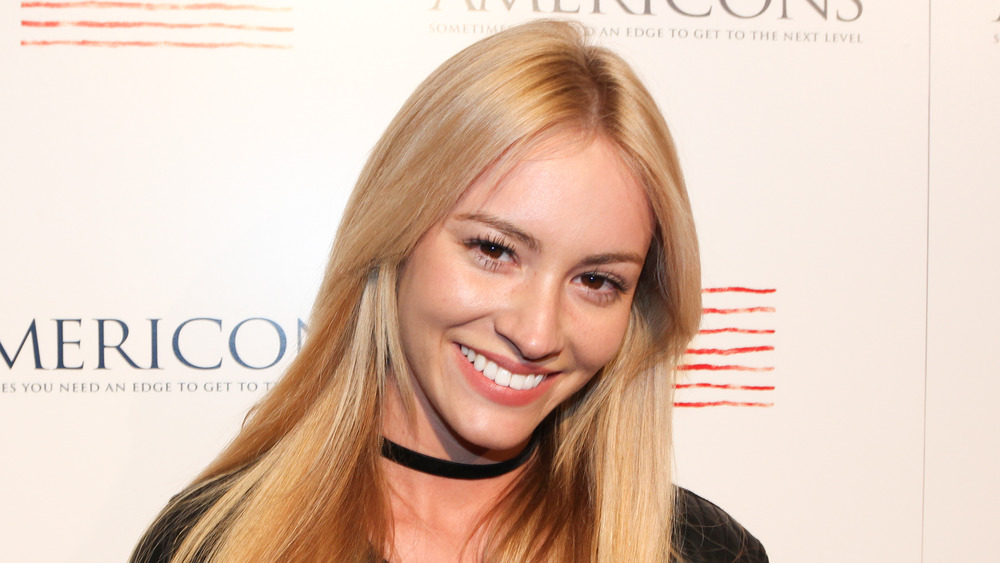 Bryana Holly poses red carpet
