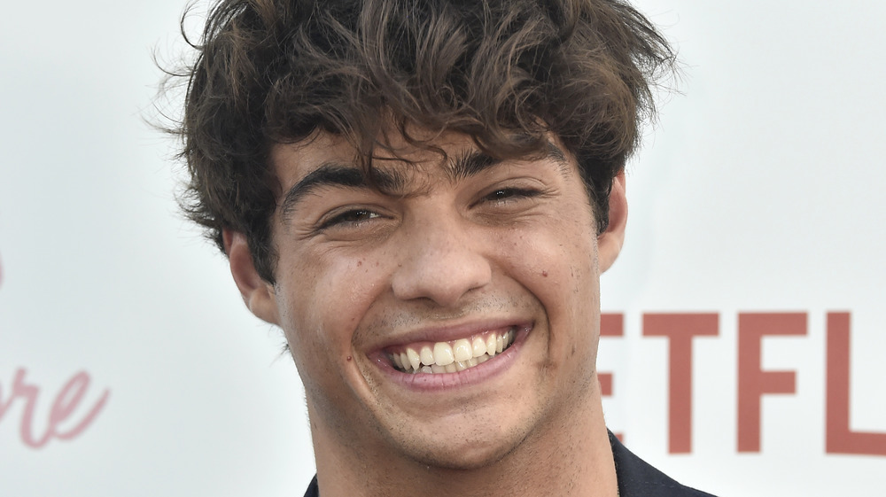 Noah Centineo grinning