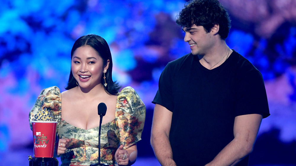 Noah Centineo and Lana Condor accepting award