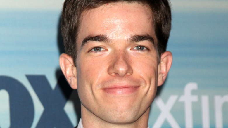 John Mulaney smiling