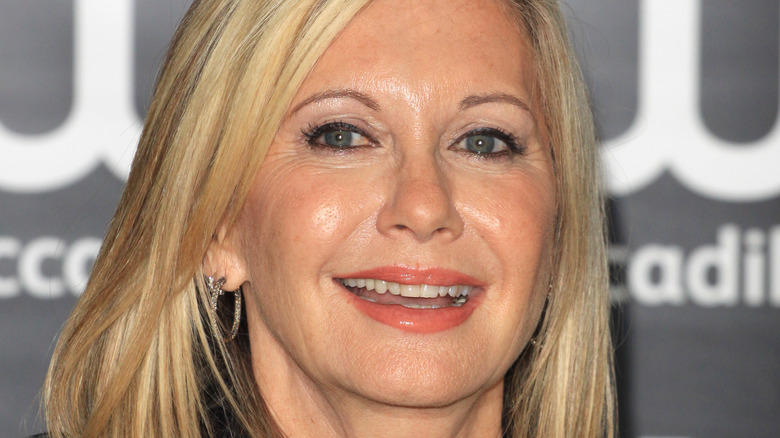 Olivia Newton-John smiling in 2018 