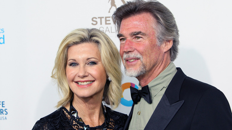 Olivia Newton-John and John Easterling smiling