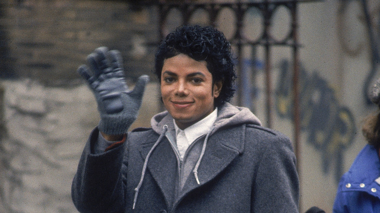 Paris Jackson  in his youth, waving