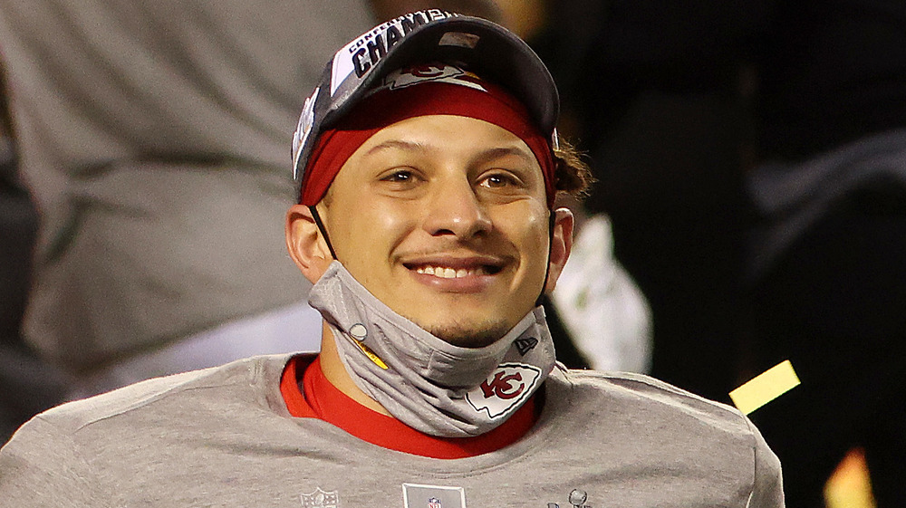 Patrick Mahomes smiling after the Kansas City Chiefs won the AFC championship