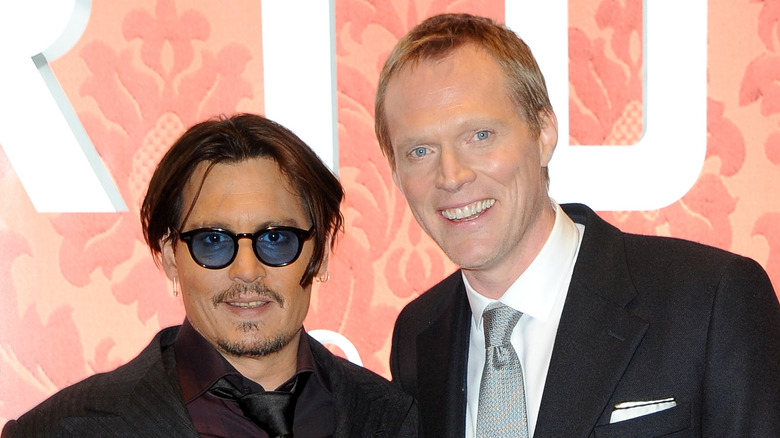 Johnny Depp and Paul Bettany smiling