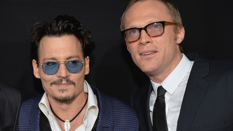 Johnny Depp and Paul Bettany smiling