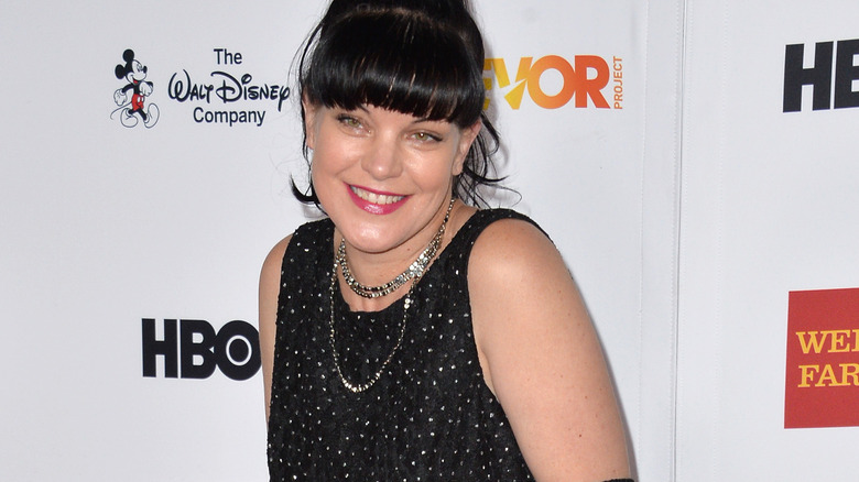 Pauley Perrette smiles on the red carpet