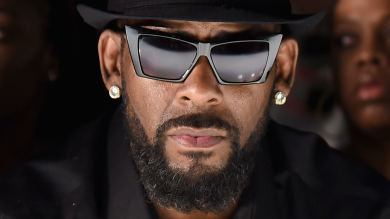 R. Kelly wearing sunglasses