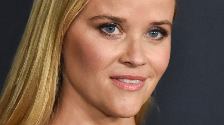 Reese Witherspoon poses on the red carpet