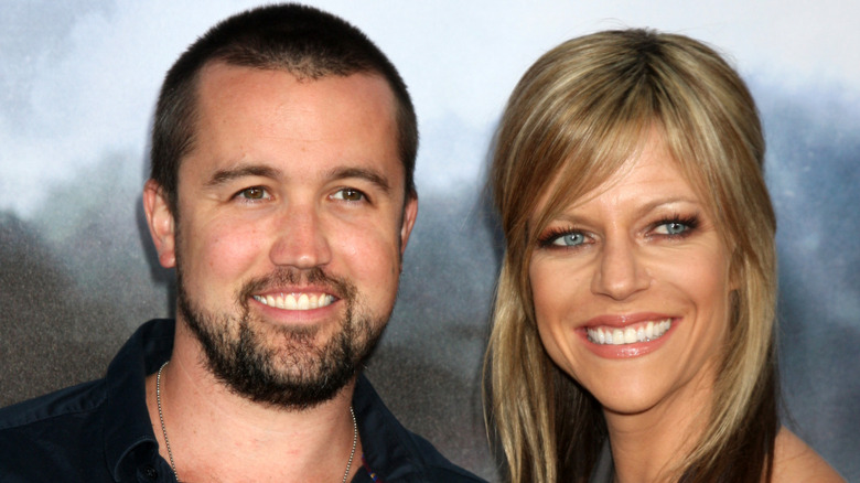 Rob McElhenney and Kaitlin Olson smiling in 2010