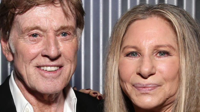 Robert Redford and Barbra Streisand posing