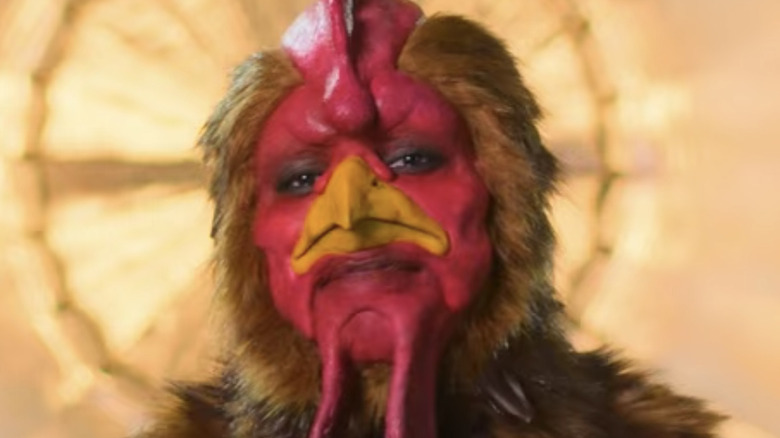Kelechi as the rooster on Sexy Beasts