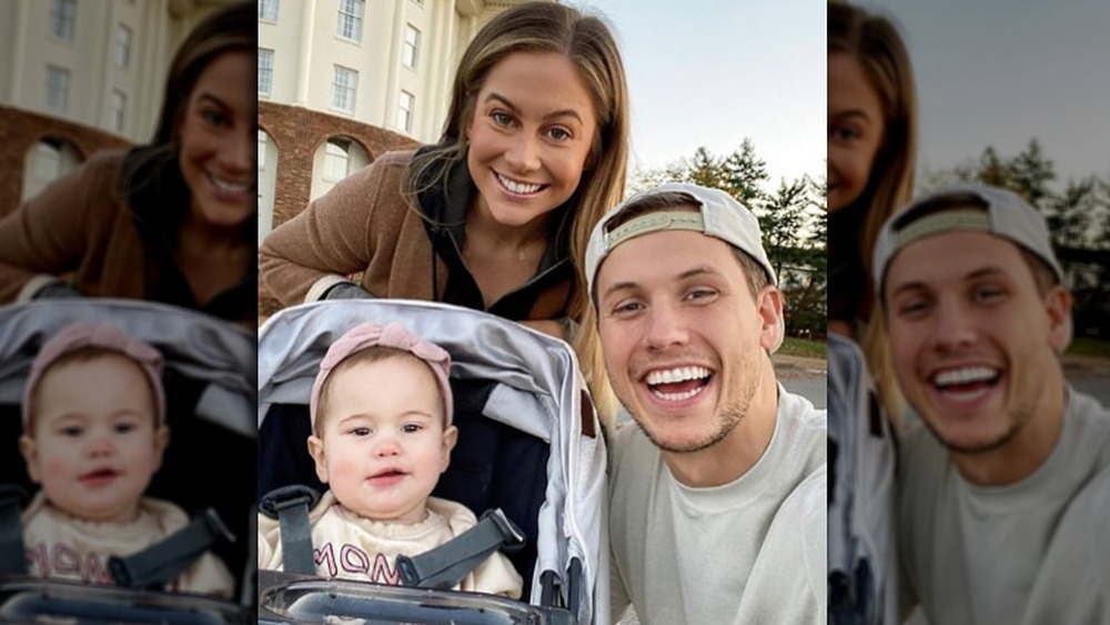 Shawn Johnson takes a selfie with a husband and her daughter