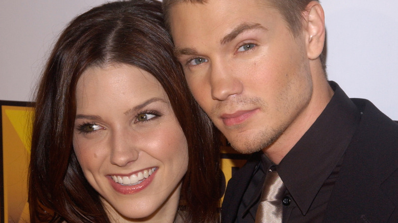 Sophia Bush and Chad Michael Murray posing cheek to cheek