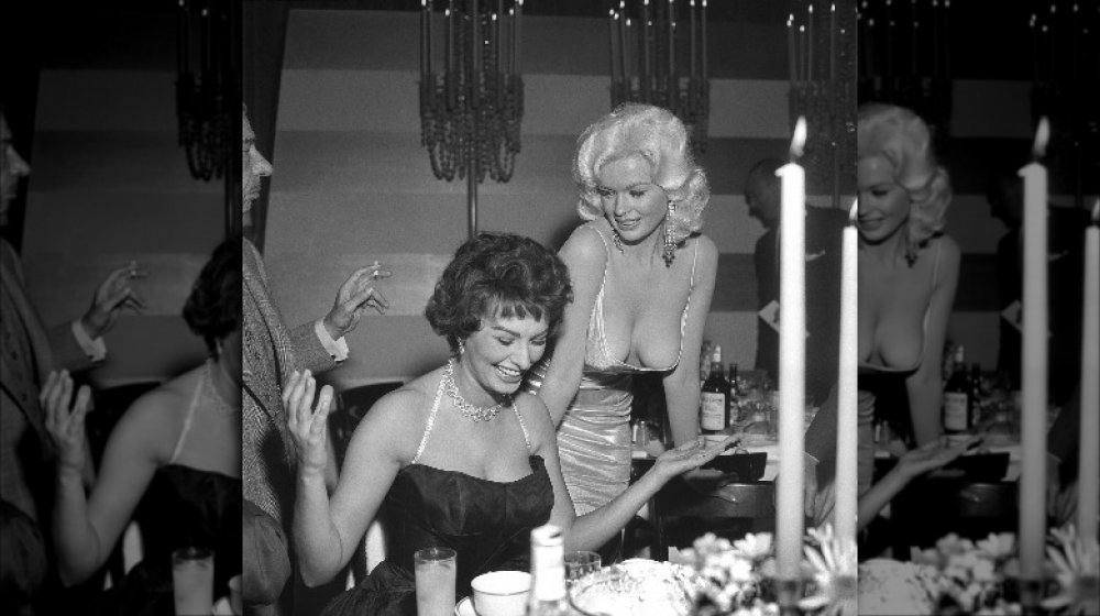 Sophia Loren and Jayne Mansfield at a party thrown by Paramount Studios for Loren in 1957