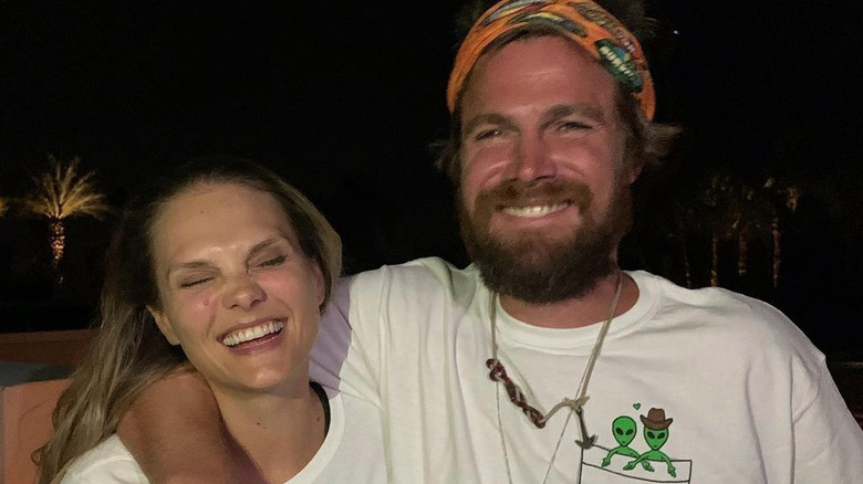Cassandra Jean Amell and Stephen Amell smiling