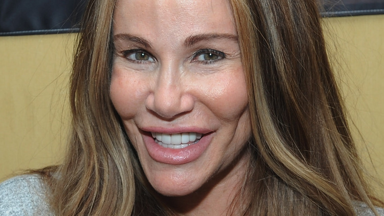 Tawny Kitaen poses