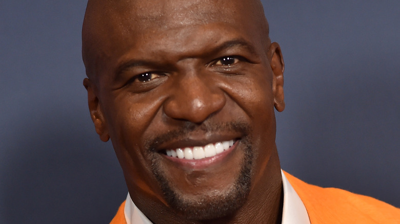 Terry Crews flashes a big smile at NBC upfronts