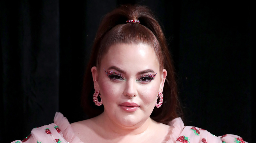 Tess Holliday posing with glitter makeup