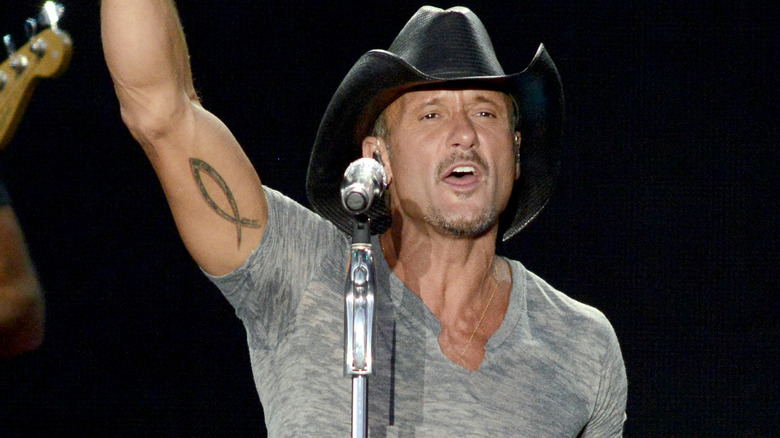 Tim McGraw smirking