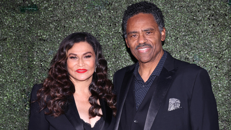 Tina Knowles with Richard Lawson smiling